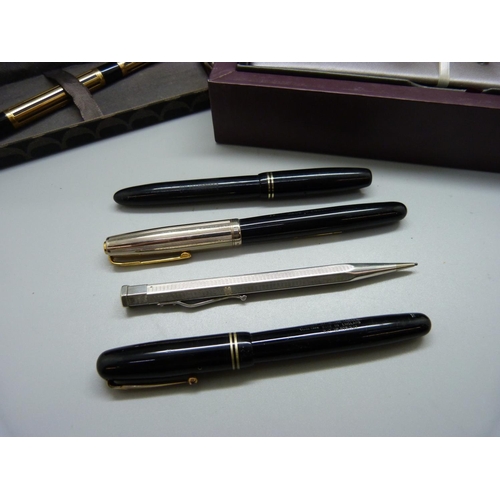 827 - A black and gold plated Waterman pen with 18ct gold nib, three pens with 14ct gold nibs, Burnham No.... 