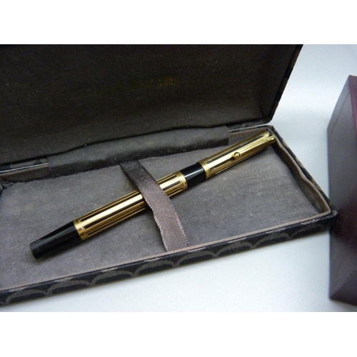 827 - A black and gold plated Waterman pen with 18ct gold nib, three pens with 14ct gold nibs, Burnham No.... 