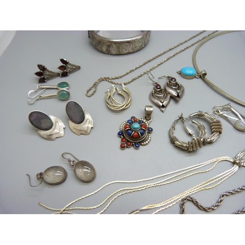 833 - A silver bangle, a/f dented, three silver necklaces, other necklaces, a silver stone set pendant and... 