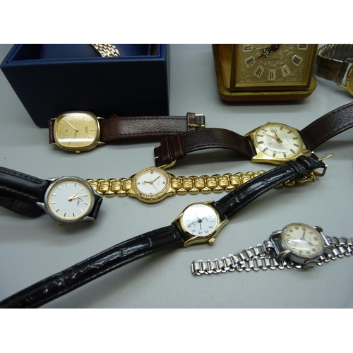 848 - A collection of wristwatches and a travel clock