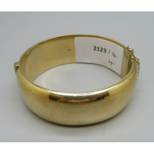 894 - A gold plated silver bangle, 40g