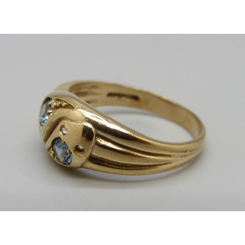 926 - A 9ct gold ring set with blue and white stones, (lacking one small white stone), 3.5g, P