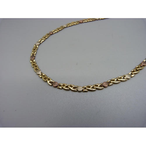 947 - A 9ct gold necklace, boxed, 10.9g, 39cm