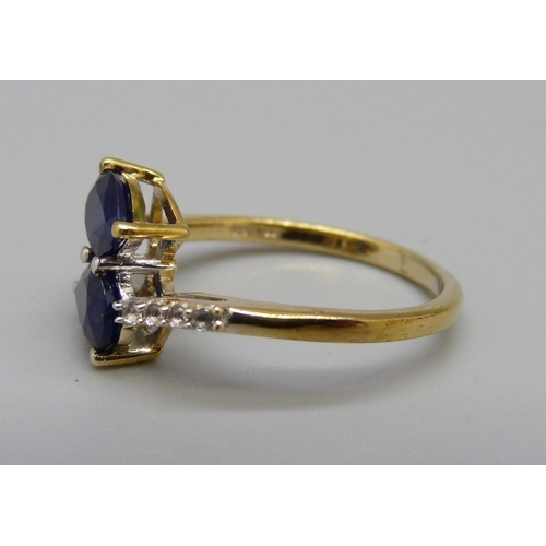 949 - A silver gilt and sapphire ring, L