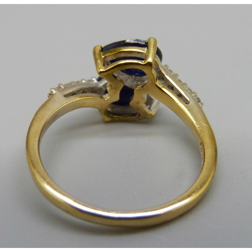 949 - A silver gilt and sapphire ring, L