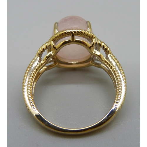 966 - A silver gilt, cabochon morganite ring, with certificate, O