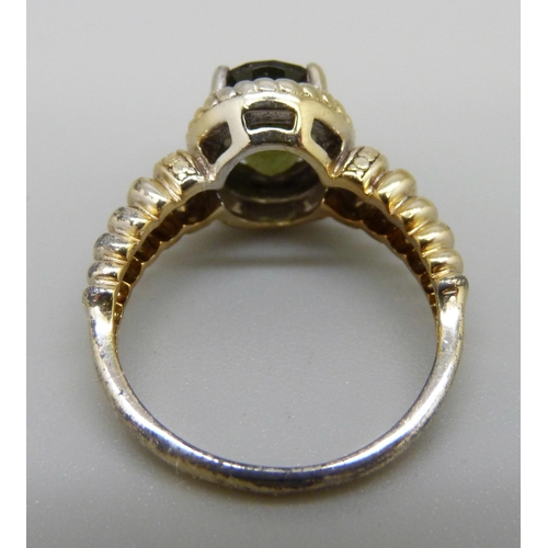 968 - A silver gilt, Modavite solitaire ring, with certificate, L