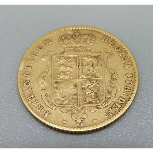 980 - A Victorian 1871 half sovereign with shield back, die number 60