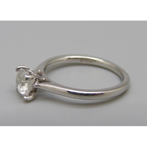 983 - A platinum set round brilliant cut diamond ring, 0.80 carat diamond weight, colour D, clarity SI2, 3... 