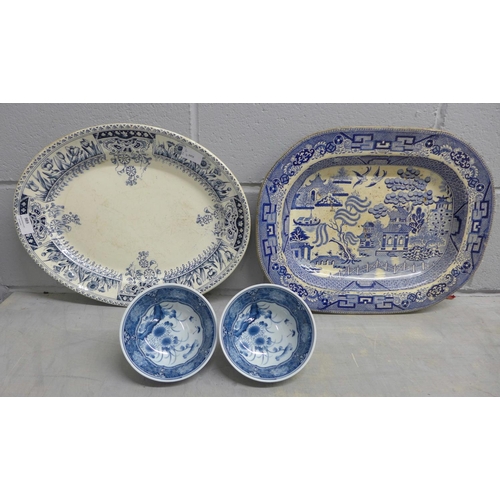 989 - A blue and white Willow Pattern plate, one other and two Chinese bowls **PLEASE NOTE THIS LOT IS NOT... 