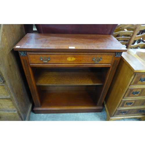 100 - A small inlaid mahogany and gilt mounted open bookcase