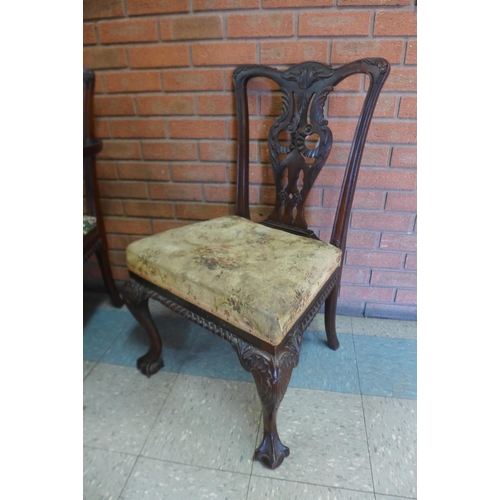 105a - A Chippendale style carved mahogany chair back settee and a pair of side chairs