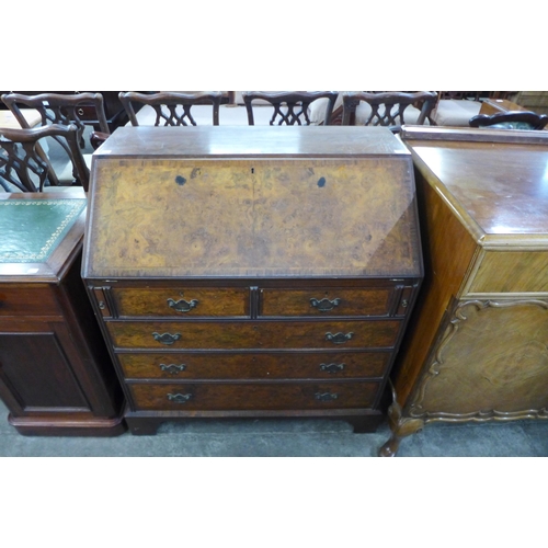 106 - A George I style burr walnut bureau