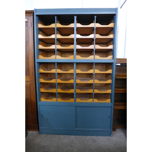 118 - A painted beech haberdashery shop cabinet