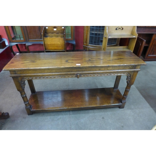 13 - A 17th Century style carved Ipswich oak serving table