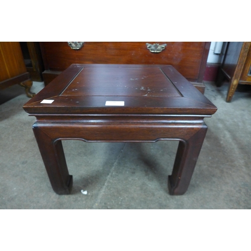 134 - A Chinese hardwood coffee table