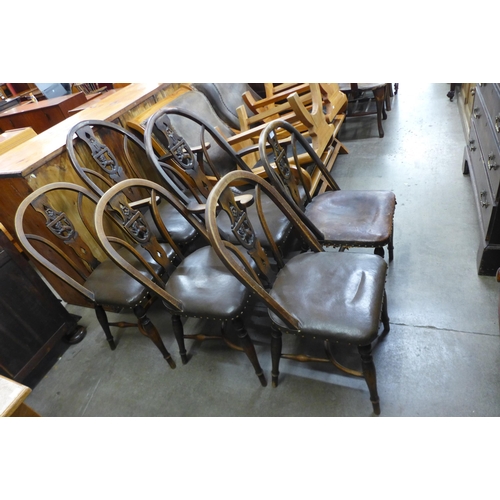 135 - A set of six late 19th/early 20th Century beech Windsor chairs