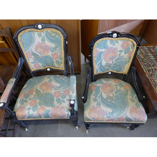 159 - A pair of Victorian Aesthetic Movement ebonised and fabric upholstered chairs