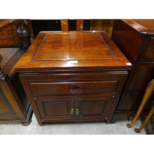 166 - A small Chinese hardwood cabinet