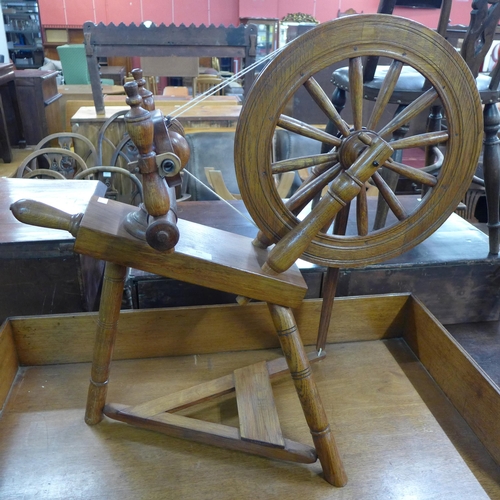 188 - An oak spinning wheel