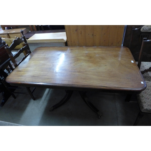 250 - A George IV mahogany rectangular tilt top dining table