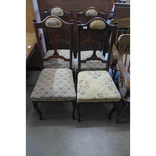 251 - A set of four Edward VII beech chairs