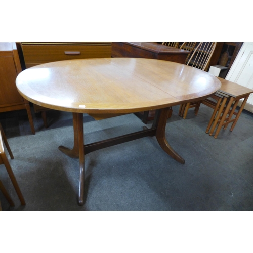 72 - A Nathan teak extending dining table