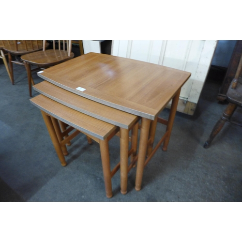 76 - A teak nest of tables