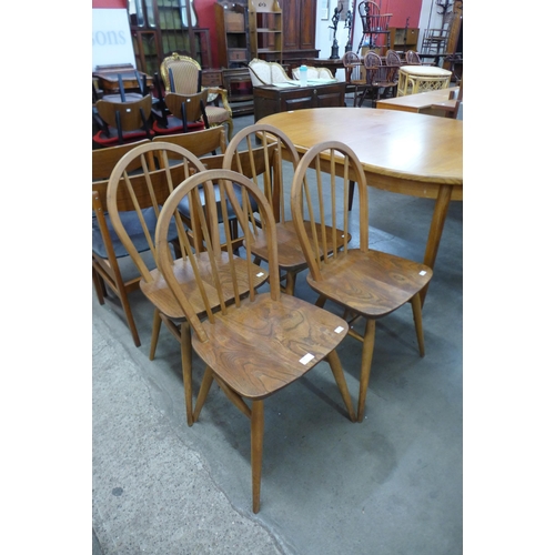 82 - A set of four Ercol elm and beech Windsor chairs