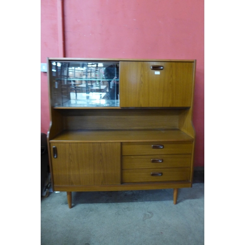 88 - A teak highboard