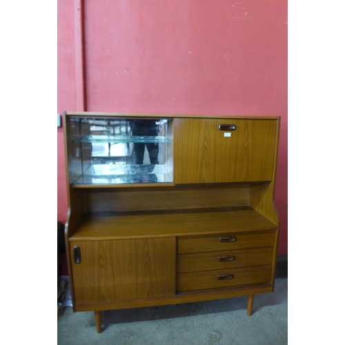 88 - A teak highboard