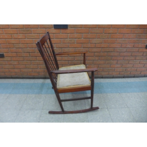 88F - A Danish Sibast rosewood rocking chair, designed by Arne Vodder

*Accompanied by CITES A10 certifica... 