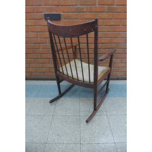 88F - A Danish Sibast rosewood rocking chair, designed by Arne Vodder

*Accompanied by CITES A10 certifica... 