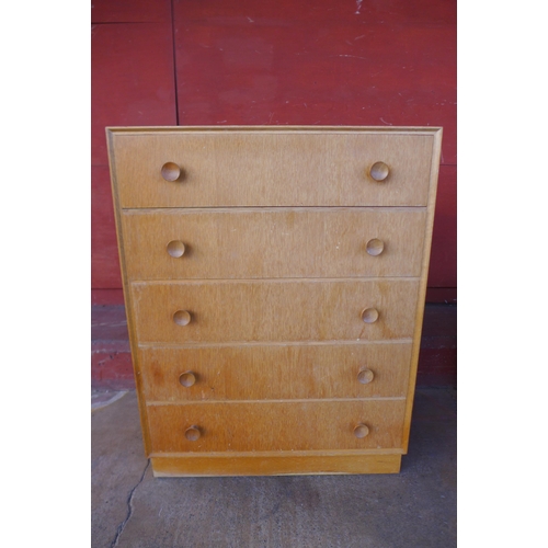 88j - A light oak chest of drawers