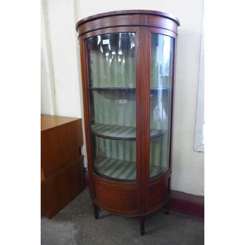 92 - An Edward VII satinwood demi-lune display cabinet