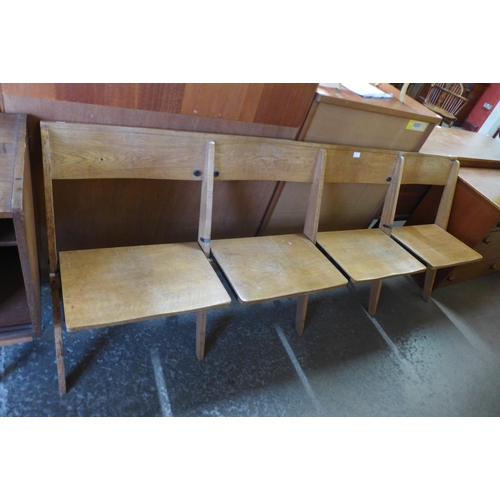 93 - A vintage oak four seat folding bench