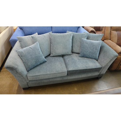 1401 - An aquamarine corduroy two seater sofa