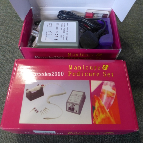 3058 - Two Mercedes 2000 manicure/pedicure sets