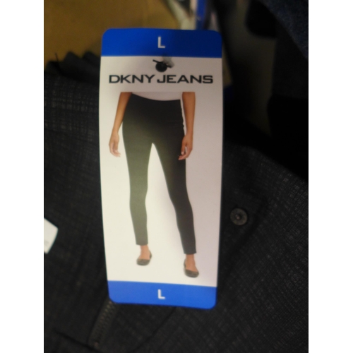 3323 - Four Pairs of woman's DKNY stretch trousers, size: large * this lot is subject to VAT