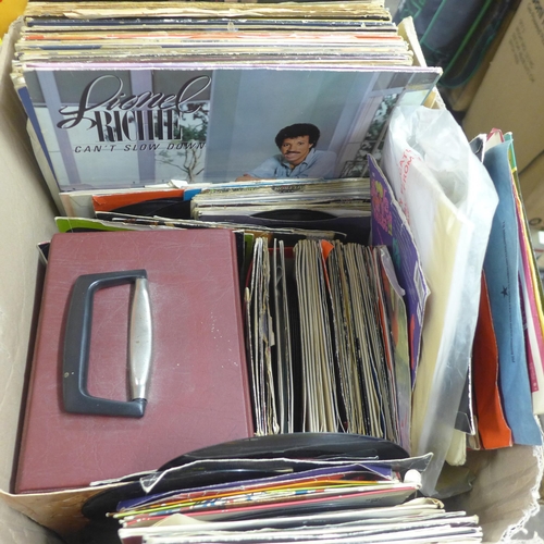 2111 - Approx. 50 1980's LP's, plus 100 45 singles, mostly 80's