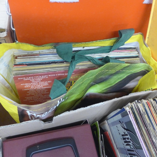 2111 - Approx. 50 1980's LP's, plus 100 45 singles, mostly 80's