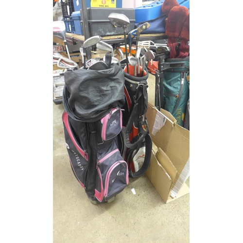 2163 - 2 Golf bags (Motocaddy & Woodworm) containing various items and woods inc. Wilson, Longbridge, Dunlo... 