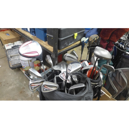 2163 - 2 Golf bags (Motocaddy & Woodworm) containing various items and woods inc. Wilson, Longbridge, Dunlo... 