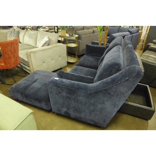 1442 - A midnight blue velvet, high back three seater sofa and footstool