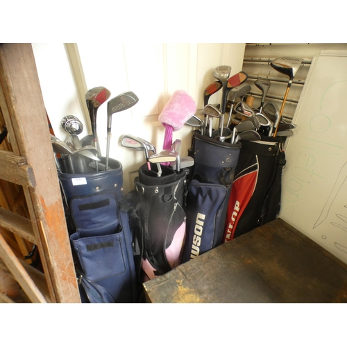 2441 - 4 golf bags and Approx. 50 golf clubs