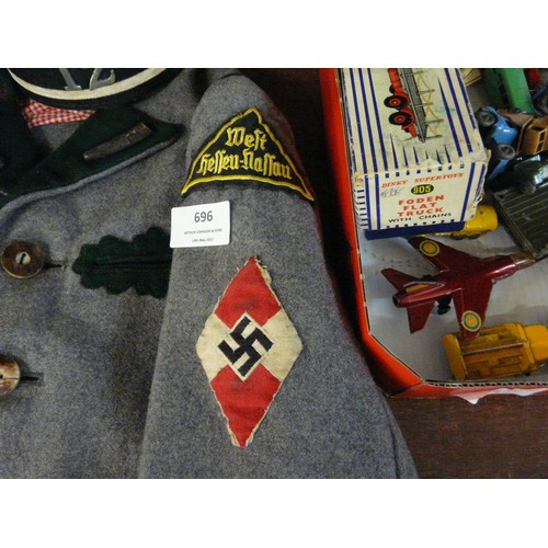 696 - A WWII German Hitler Youth jacket and cap, with added badges, (fit 4-6 yrs approximate)