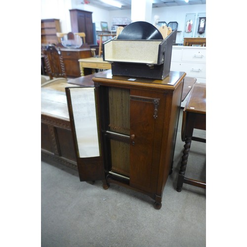 171 - An HMV mahogany record index cabinet and a case of records