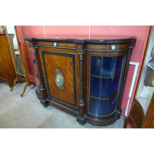 93 - A Victorian amboyna, ebonised and gilt metal mounted credenza, with Sevres style painted porcelain p... 