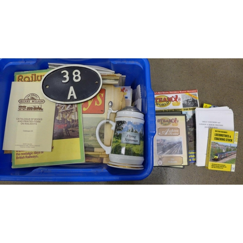 1125 - A box of railway related items including DVDs, newspapers, magazines, a stein and a sign **PLEASE NO... 