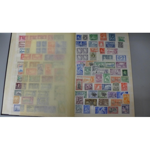 669 - Stamps: King George VI unmounted mint Commonwealth stamps in sixteen page stock book